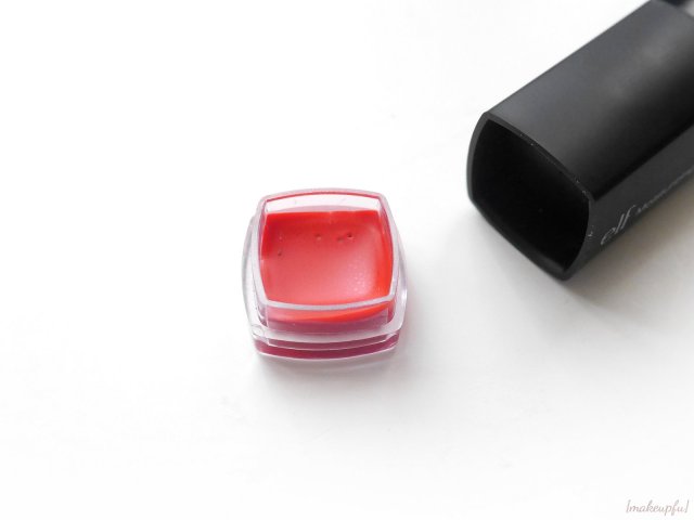 The plastic colored base of the e.l.f. Studio Moisturizing Lipstick has a removable containing a lip color pot.
