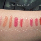 e.l.f. Super Glossy Lip Shine Swatches: Pink Kiss, Candlelight, Goddess, Pink Lemonade, Watermelon, Juiced Berry, Los Angeles, New York City and Malt Shake (Direct Sunlight)
